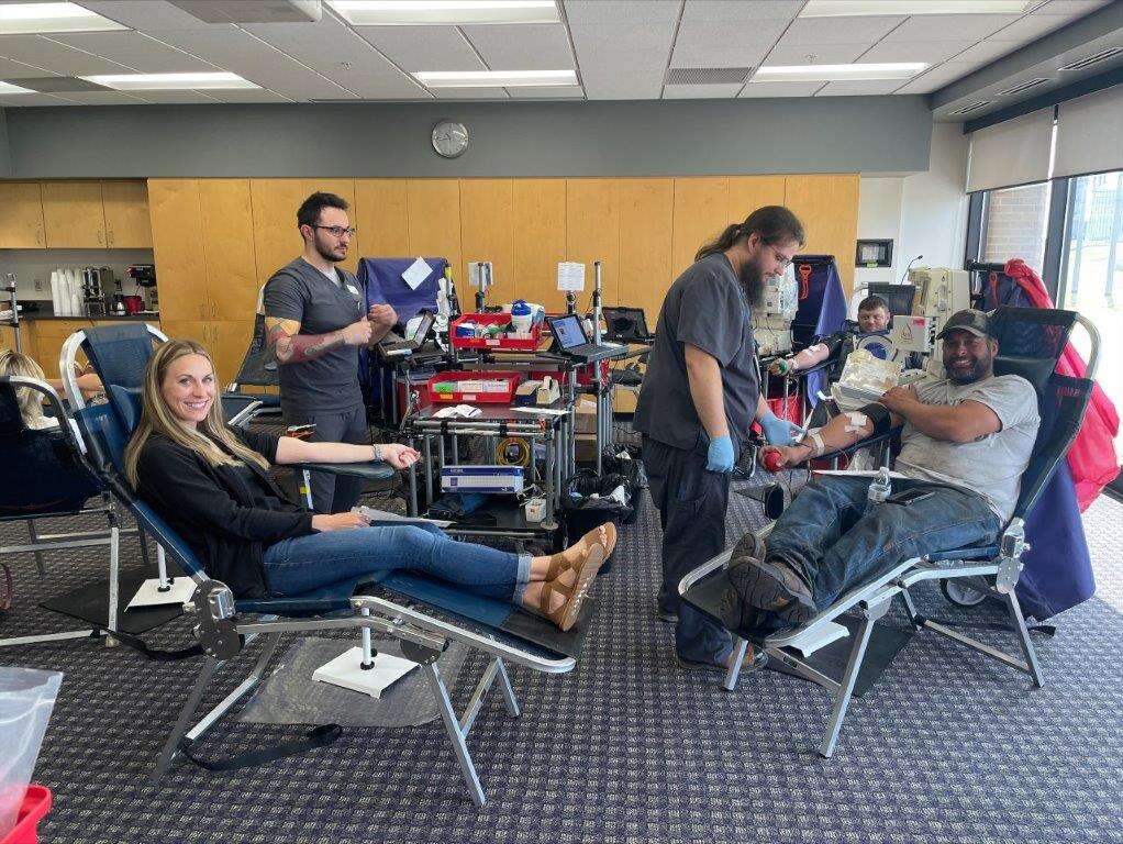 Two people donating blood Rainbow Energy Center